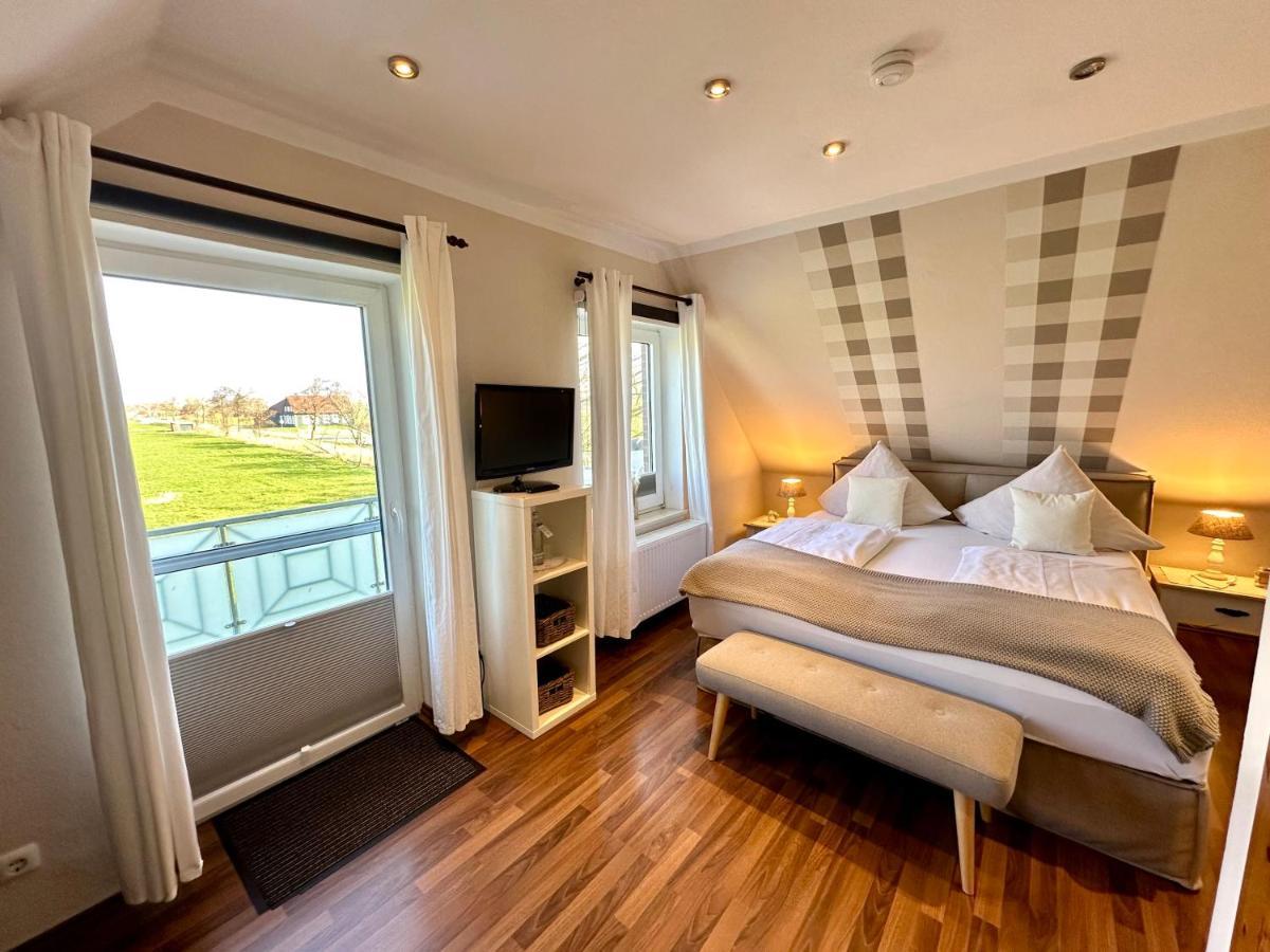 Landhotel Bauernstuben Neuharlingersiel Esterno foto