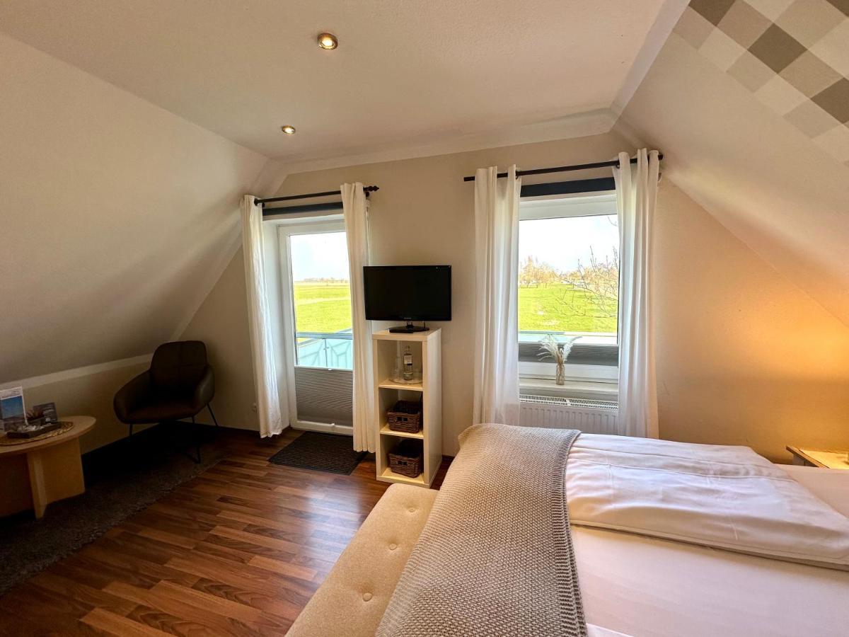 Landhotel Bauernstuben Neuharlingersiel Esterno foto